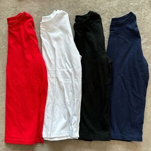 BUNDLE OF 4 Solid t-shirts. RED/WHITE/ BLUE AND BLACK. Long sleeves size 6/7